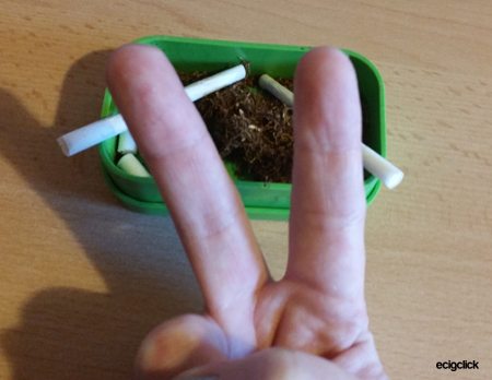 two fingers to smoking