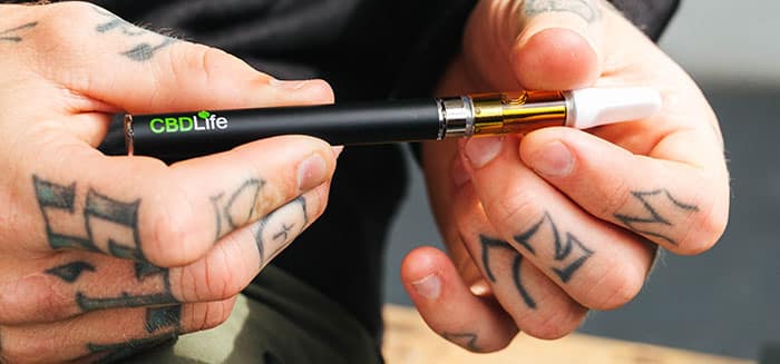 CBDlife Pure Pen in hand