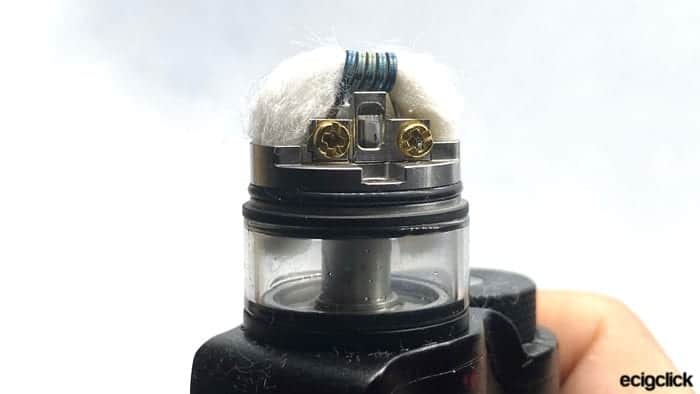 Showing a side on view of the Vandy Vape Pyro V3 without top cap, to show the wicks are level in the tank