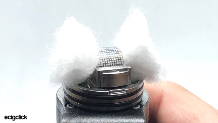 Yachtvape Meshlock RDA with cotton having been trimmed after being thinned out