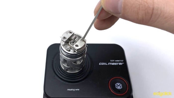 Vapefly Brunhilde MTL RTA Clamping Coil into Place