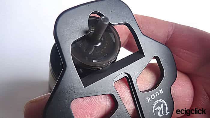 Ruok bottle opener in use