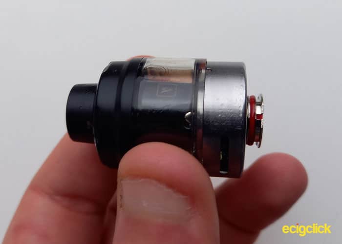 Vaporesso PX80 Pod Mod pod coil handing out