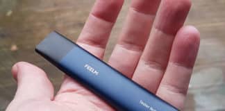 feelm air pod in hand