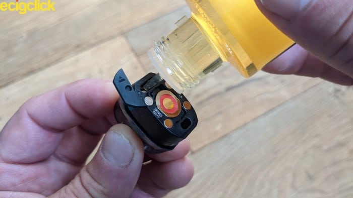 Filling the pod of the Vaporesso luxe xr pod kit