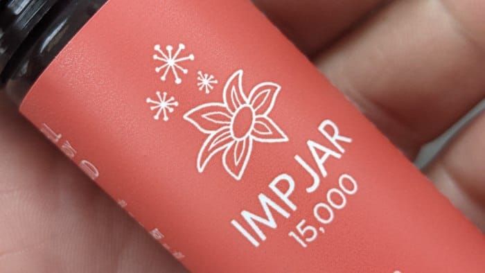 Imp Jar Logo on side of bottle