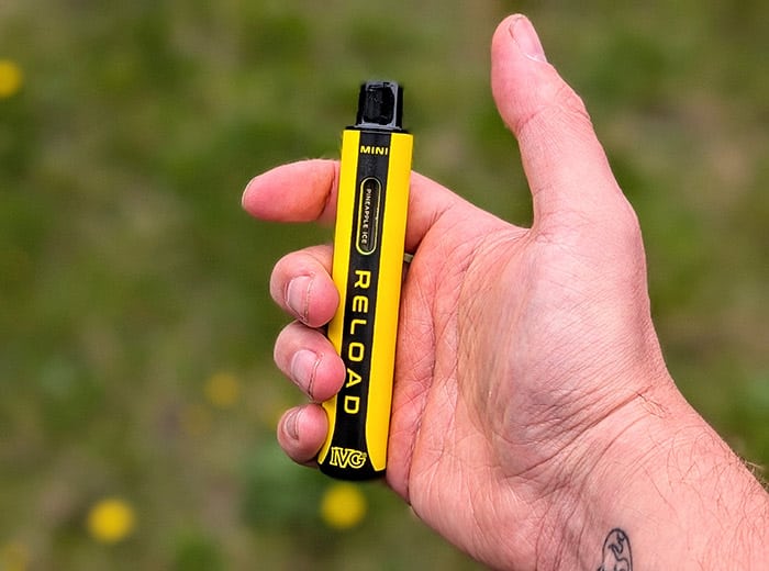 ivg reload mini vape in hand