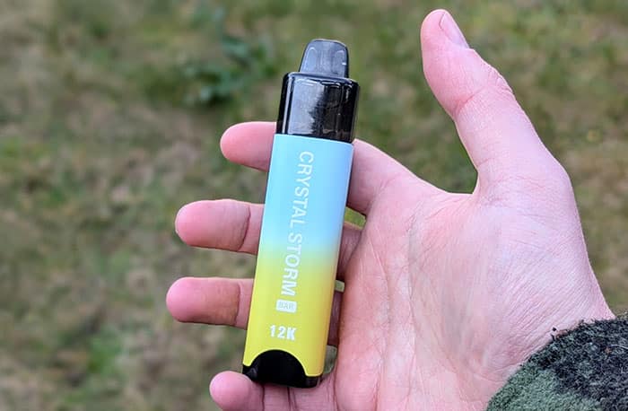 crystal storm bar 12k vape in hand