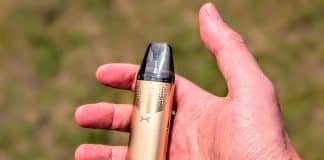 OXVA NeXLIM 2 Mini Review- Small Form, Top Performance? oxva nexlim 2 mini in hand